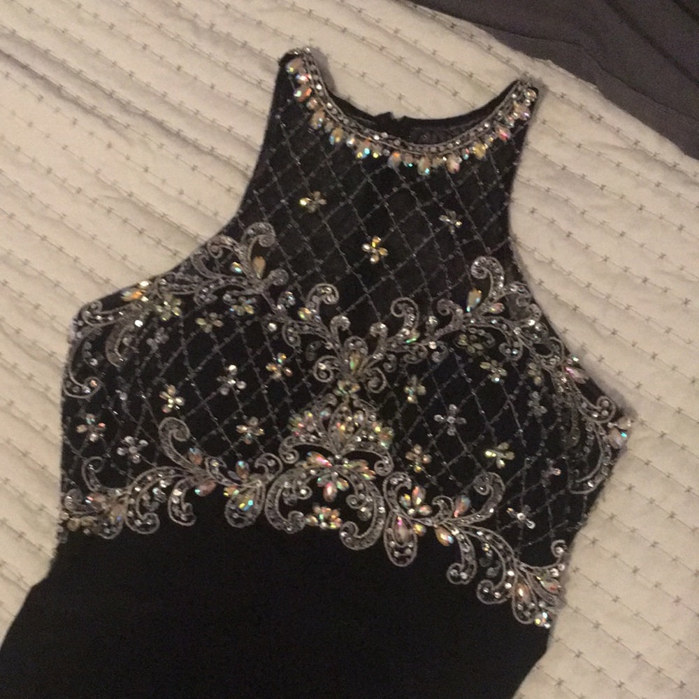 One black and silver threads with beads and Aurora borealis and gold gems